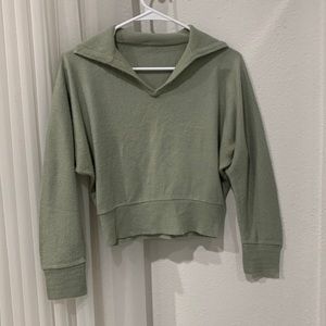Pale green light sweater
